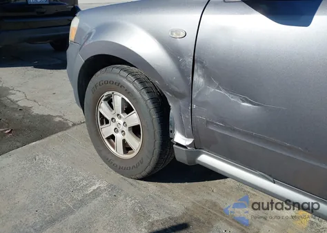 2009 Mercury Mariner I4 из США, поврежденный, VIN 4M2CU81729KJ24536